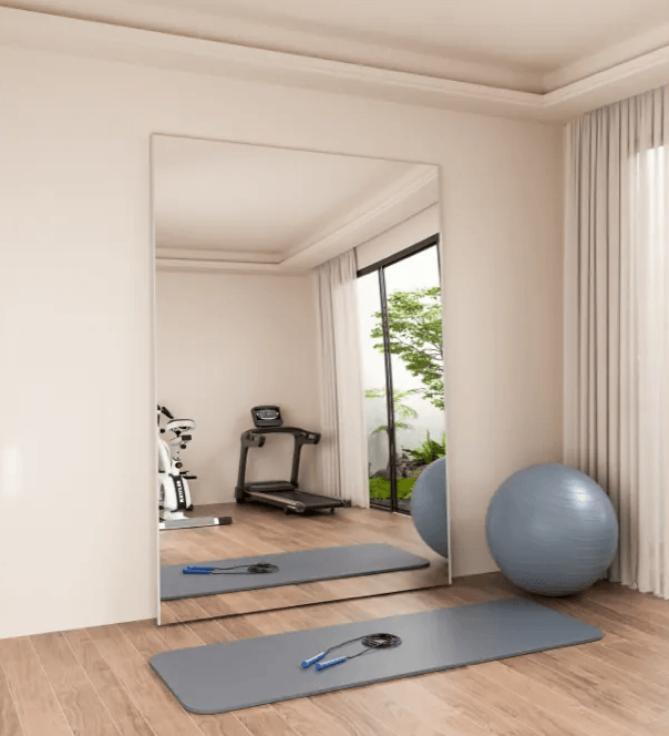 Plumi Wall Mirror standing at home